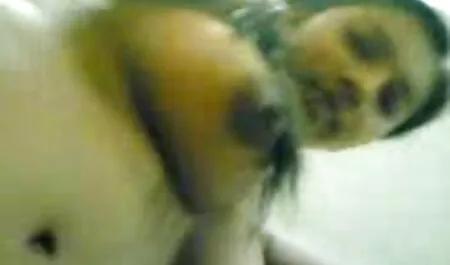 Sucking two old man xxx cocks from holes in the wall